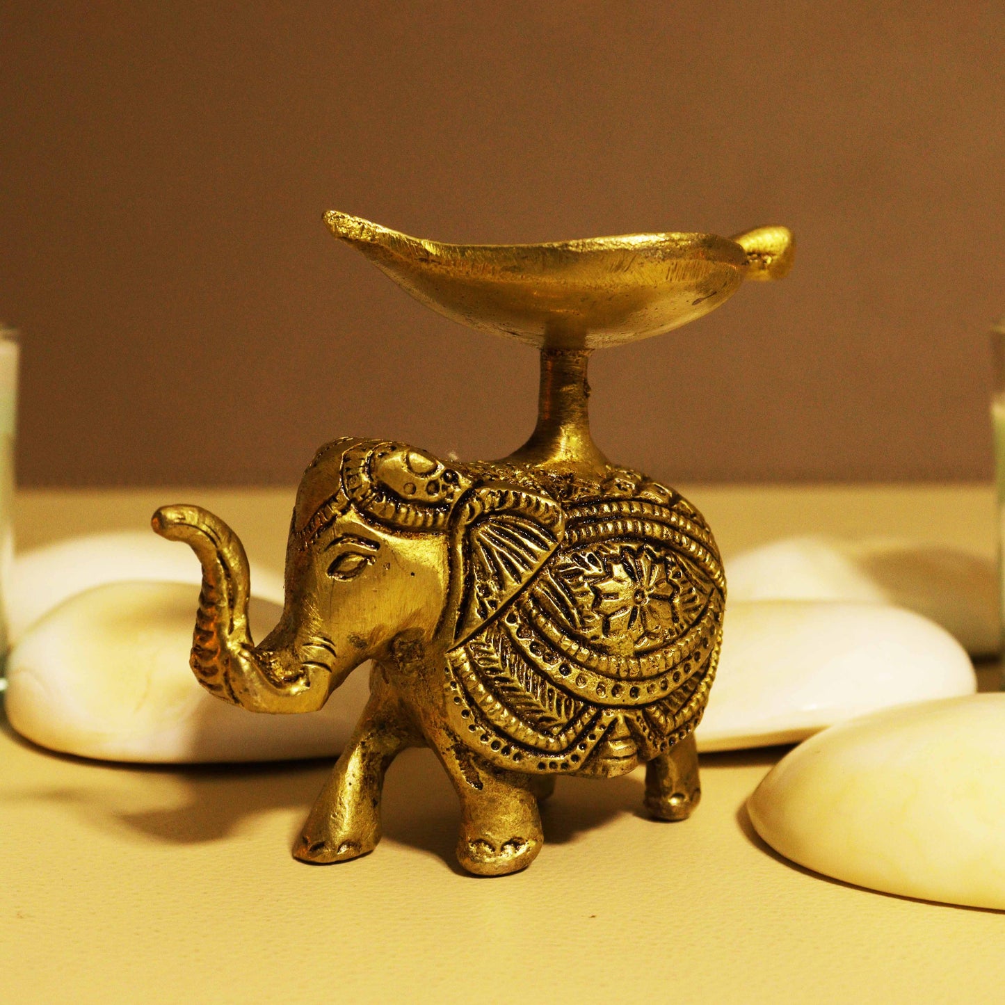 Antique elephant diya