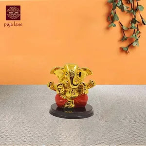ऑरेंज प्रीमियम रेज़िन गणेश प्रतिमा