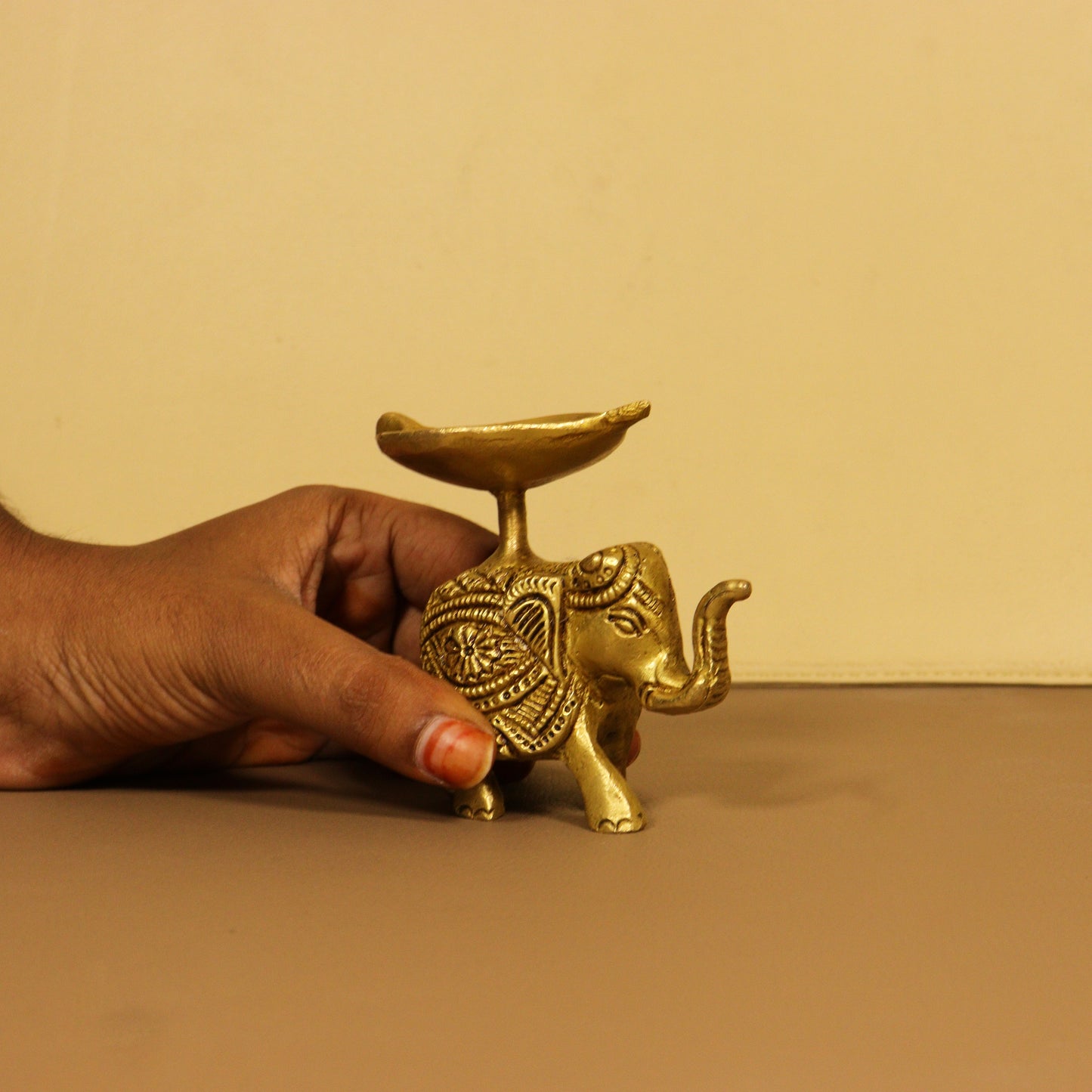 Antique elephant diya
