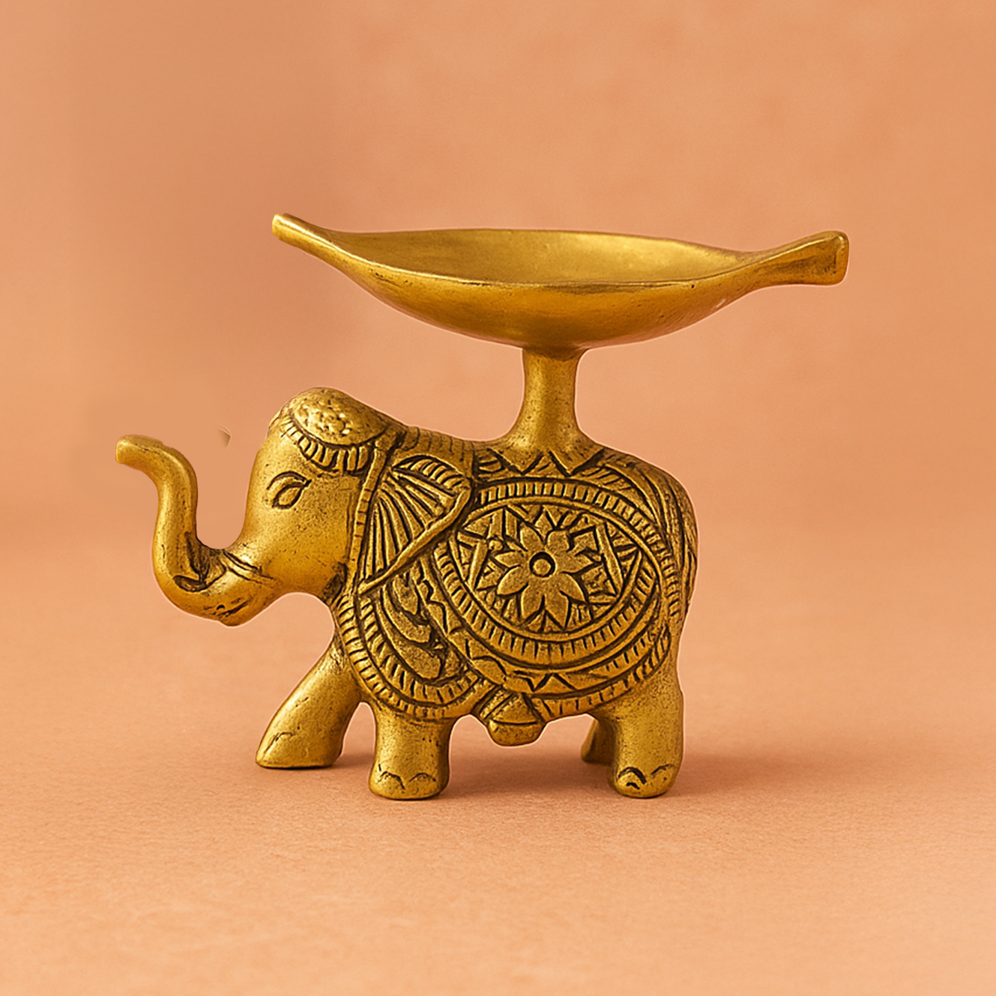 Antique elephant diya